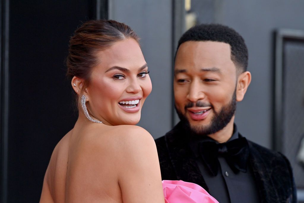 las vegas, nevada april 03 chrissy teigen and john legend attends the 64th annual grammy awards at mgm grand garden arena on april 03, 2022 in las vegas, nevada photo by axellebauer griffinfilmmagic