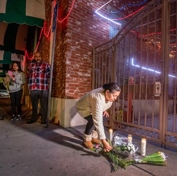 monterey park, ca january 22 after police tape was taken down, people line up to place flowers at the entrance to the star dance studio ballroom where huu can tran, a 72 year old asian male, is accused of shooting and killing 10 people and injuring 10 during the monterey park mass shooting that took place saturday night photo taken sunday, jan 22, 2023 allen j schaben los angeles times via getty images