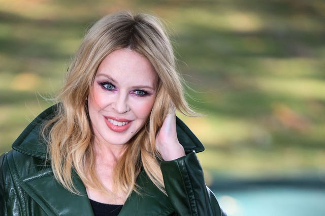 kylie minogue feathered mini dress