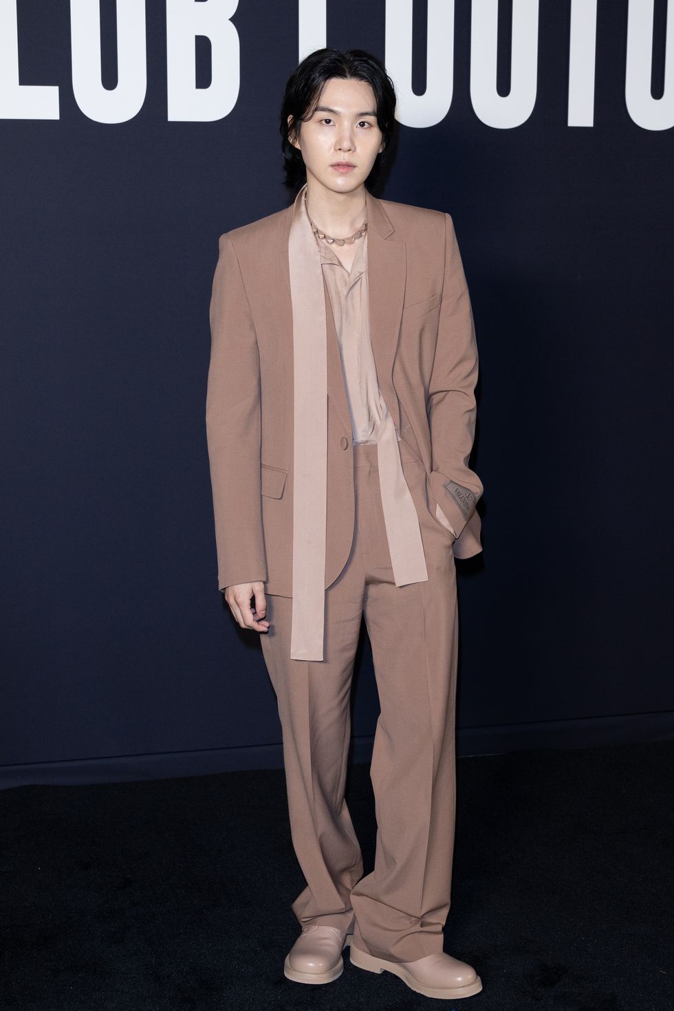 paris, france january 25 editorial use only for non editorial use please seek approval from fashion house suga from bts attends the valentino haute couture spring summer 2023 show as part of paris fashion week on january 25, 2023 in paris, france photo by marc piaseckiwireimage
