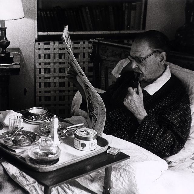 william somerset maugham, british novelist, playwright, short story writer, highest paid author in the world in the 1930s, pictured at 8am in his bedroom having breakfast in bed as he reads the paper and smokes a pipeat villa mauresque at cap ferrat in the south of france, 1954 photo by mirrorpix syndicationmirrorpix via getty images