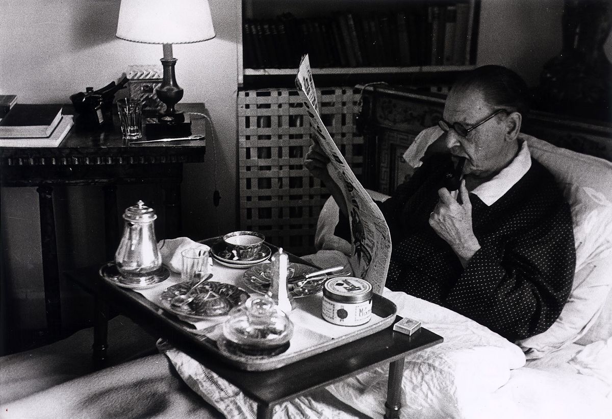 william somerset maugham, british novelist, playwright, short story writer, highest paid author in the world in the 1930s, pictured at 8am in his bedroom having breakfast in bed as he reads the paper and smokes a pipeat villa mauresque at cap ferrat in the south of france, 1954 photo by mirrorpix syndicationmirrorpix via getty images