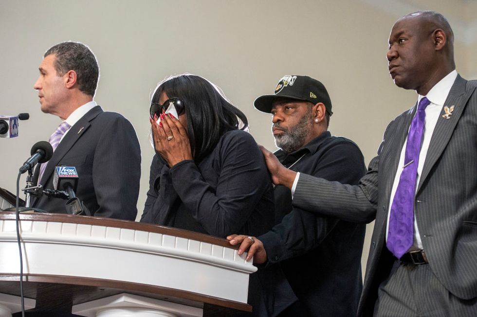 memphis, tn january 23 rowvaugn wells, second from left, becomes emotional during a press conference at mt olive cathedral cme church after she viewed footage of the violent police interaction that led to the death of her son tyre nichols memphis, tn on january 23, 2023 she is flanked by attorney antonio romanucci, from left, husband rodney wells, and attorney ben crump photo by brandon dill for the washington post via getty images