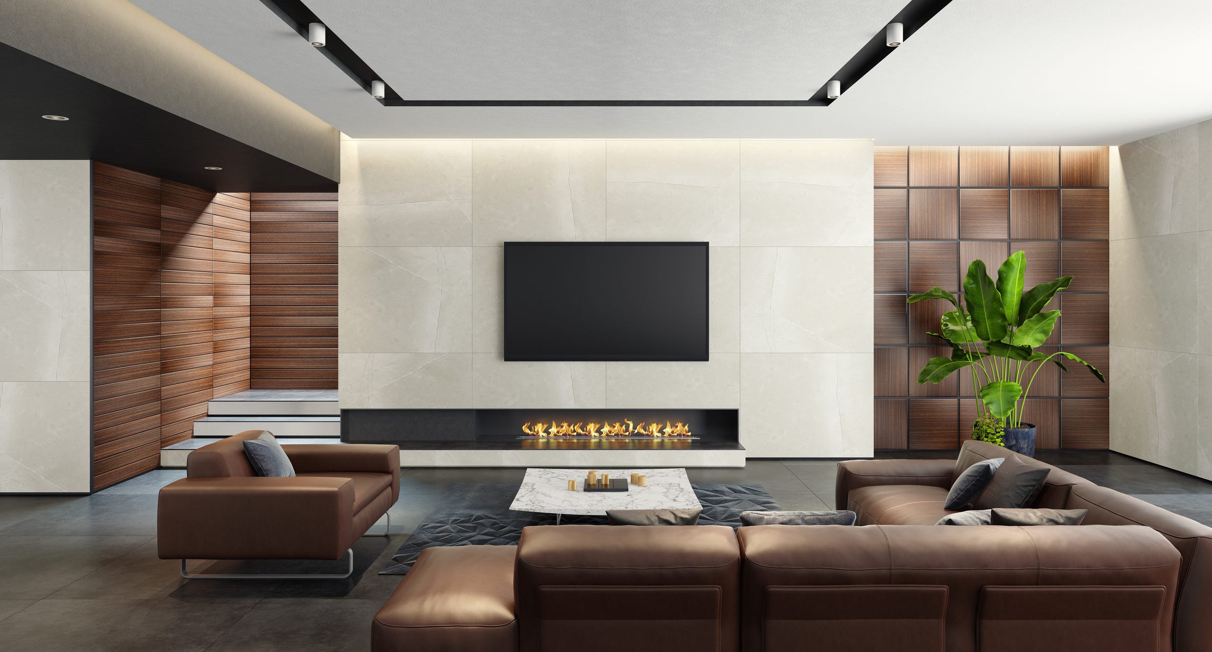 luxurious big living room with walls covered with natural materials,leather sofa and an eco fireplace stylish and comfortable living room with natural stone and wood wall coverings, eco fireplace and a big flat tv sitting area is with a modern brown leather sofa and a brown leather lounge chair with gray metal construction, black leather carpet and a marble coffee table decorative elements big plant and gray sofa cushions ceiling with strip cove lighting embedded spotlights and white spotlights
