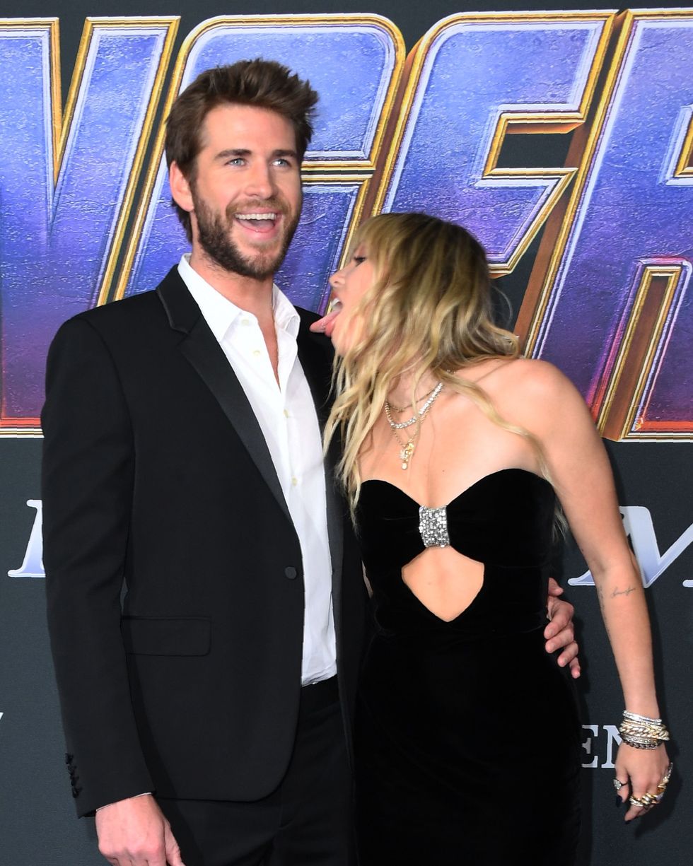 us singer miley cyrus and australian actor liam hemsworth arrive for the world premiere of marvel studios avengers endgame at the los angeles convention center on april 22, 2019 in los angeles photo by valerie macon afp photo credit should read valerie maconafp via getty images