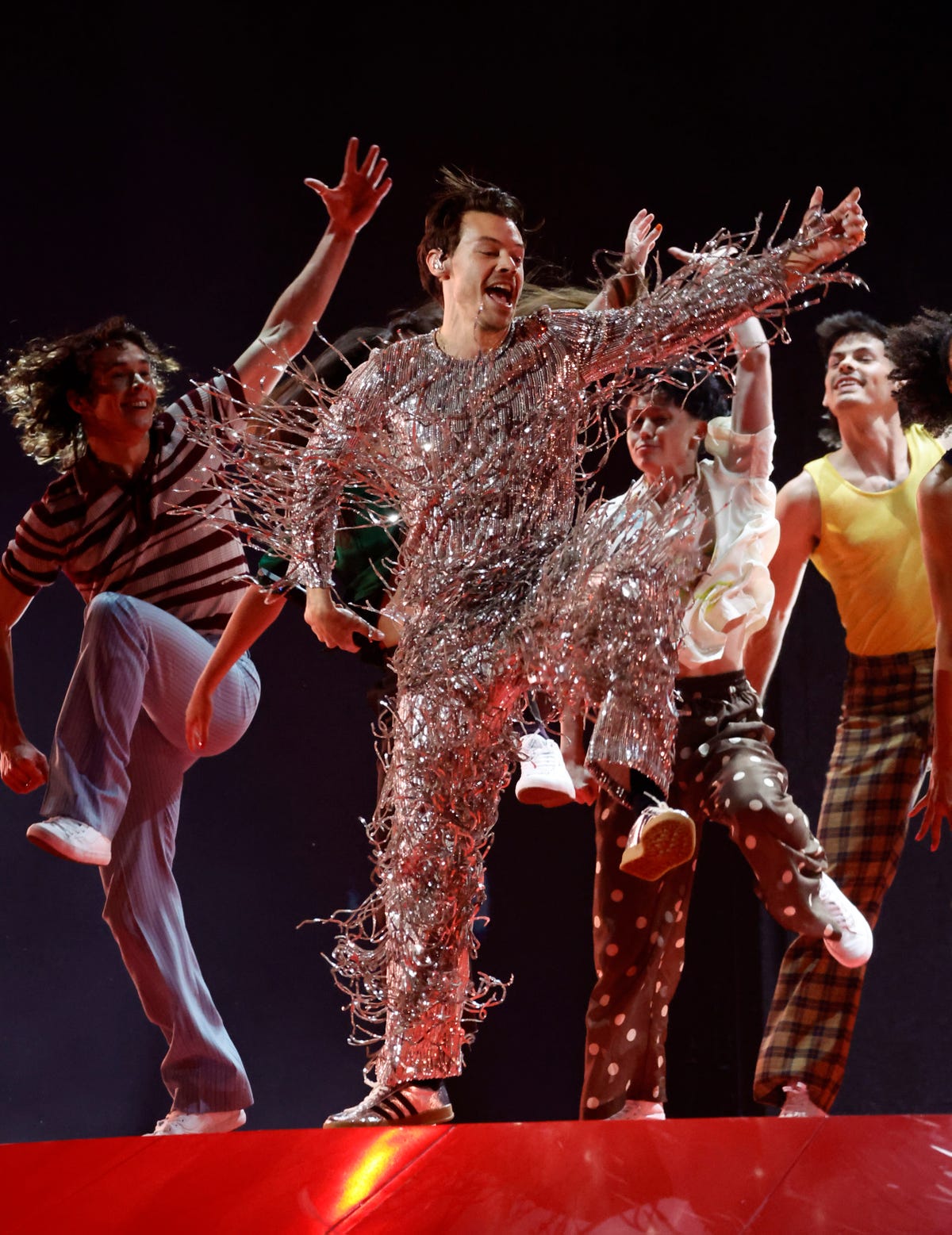 Watch Harry Styles Dance in Silver Fringe While Performing 