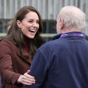 BRITAIN-ROYALS britains catherine, princess of wales l reacts as she is reunited with an old school teacher of hers following the tour of the national maritime museum cornwall on february 9, 2023 in falmouth, england photo by chris jackson pool afp photo by chris jacksonpoolafp via getty images
