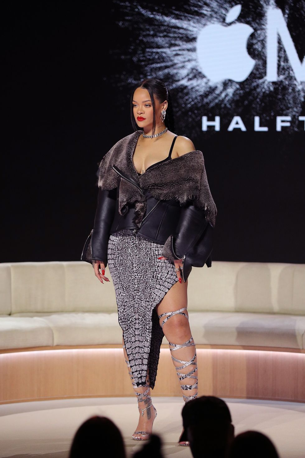 Rihanna Shredded 2-Piece Bump-Baring Outffit