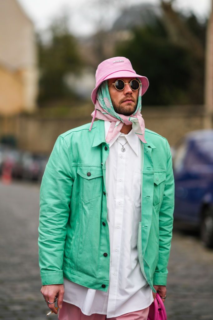 paris, france january 22 influencer karb wears a pale pink bob from jacquemus, gold sunglasses, a pale green and pink print pattern silk scarf, a white shirt, a silver chain pendant necklace, a mint green shirt, a pink shiny leather handbag, pale pink suit pants, silver rings, outside hermes, during paris fashion week menswear fw 2022 2023, on january 22, 2022 in paris, france photo by edward berthelotgetty images