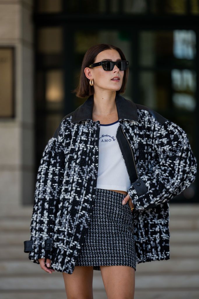 amsterdam, netherlands august 23 model vera van erp wears jacket remain, skirt gestuz, tank top a modern object, shoes prada, sunglasses oliver peoples during a street style shoot on august 23, 2022 in amsterdam, netherlands photo by christian vieriggetty images