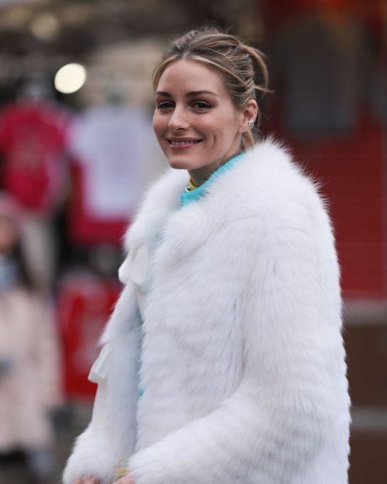 paris, france january 23 olivia palermo is seen wearing a white fur coat, a blue blazer with orange fringes, jeans and black sparkling heels before the georges hobeika show on january 23, 2023 in paris, france photo by jeremy moellergetty images