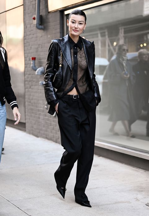 new york, new york february 11 amalie gassmann is seen wearing a black leather jacket, sheer top and black pants outside the proenza schouler show during new york fashion week fw 2023 on february 11, 2023 in new york city photo by daniel zuchnikgetty images