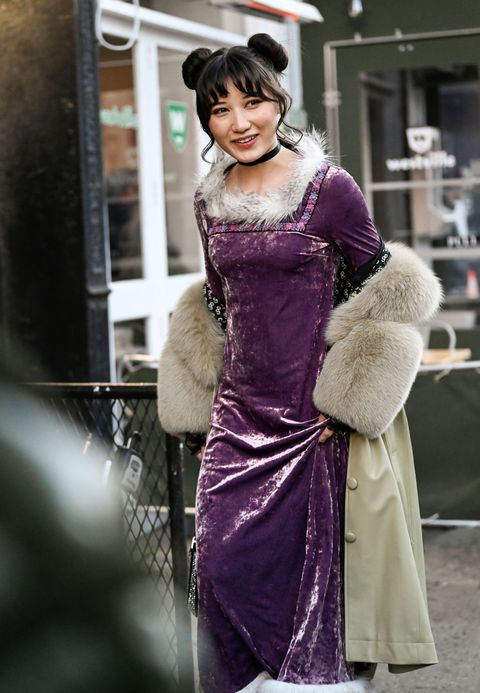 new york, new york february 11 a guest is seen wearing a purple anna sui dress outside the anna sui show during new york fashion week fw 2023 on february 11, 2023 in new york city photo by daniel zuchnikgetty images