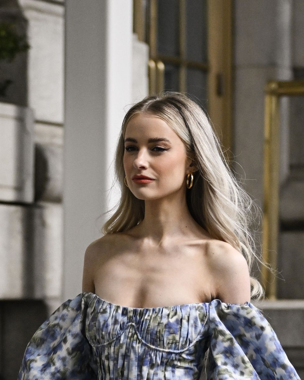 new york, new york february 13 a guest is seen wearing a light blue floral carolina herrera dress outside the carolina herrera show during new york fashion week fw 2023 on february 13, 2023 in new york city photo by daniel zuchnikgetty images