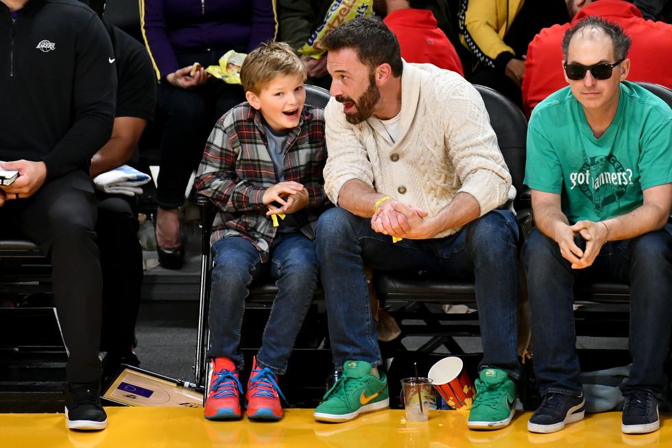 los angeles, california december 13 ben affleck and his son samuel garner affleck attend a basketball game between the los angeles lakers and the boston celtics at cryptocom arena on december 13, 2022 in los angeles, california photo by allen berezovskygetty images