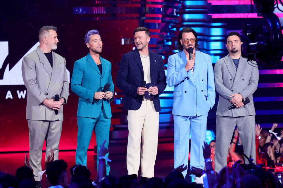 newark, new jersey september 12 l r joey fatone, lance bass, justin timberlake, jc chasez, and chris kirkpatrick of nsync speak onstage the 2023 mtv video music awards at prudential center on september 12, 2023 in newark, new jersey photo by theo wargogetty images for mtv