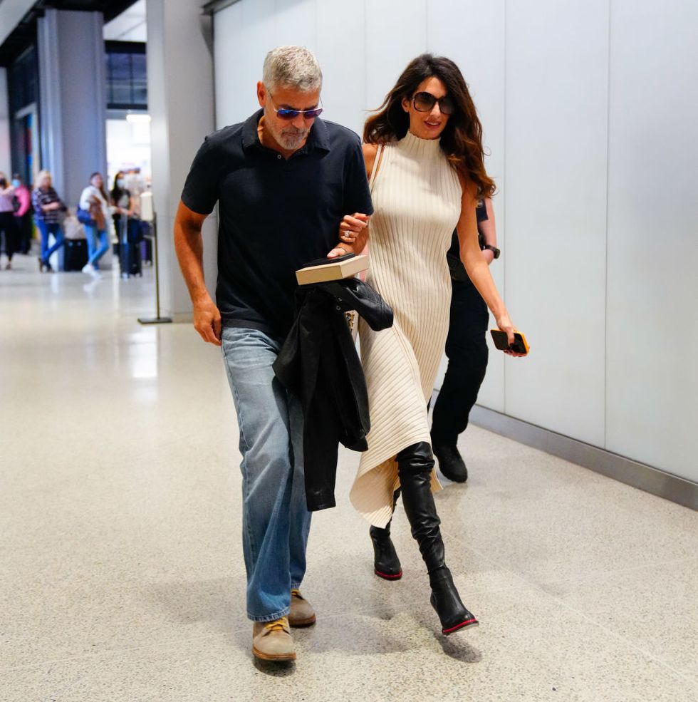 new york, new york september 23 george clooney and amal clooney head to an amtrak station on september 23, 2022 in new york city photo by gothamgc images