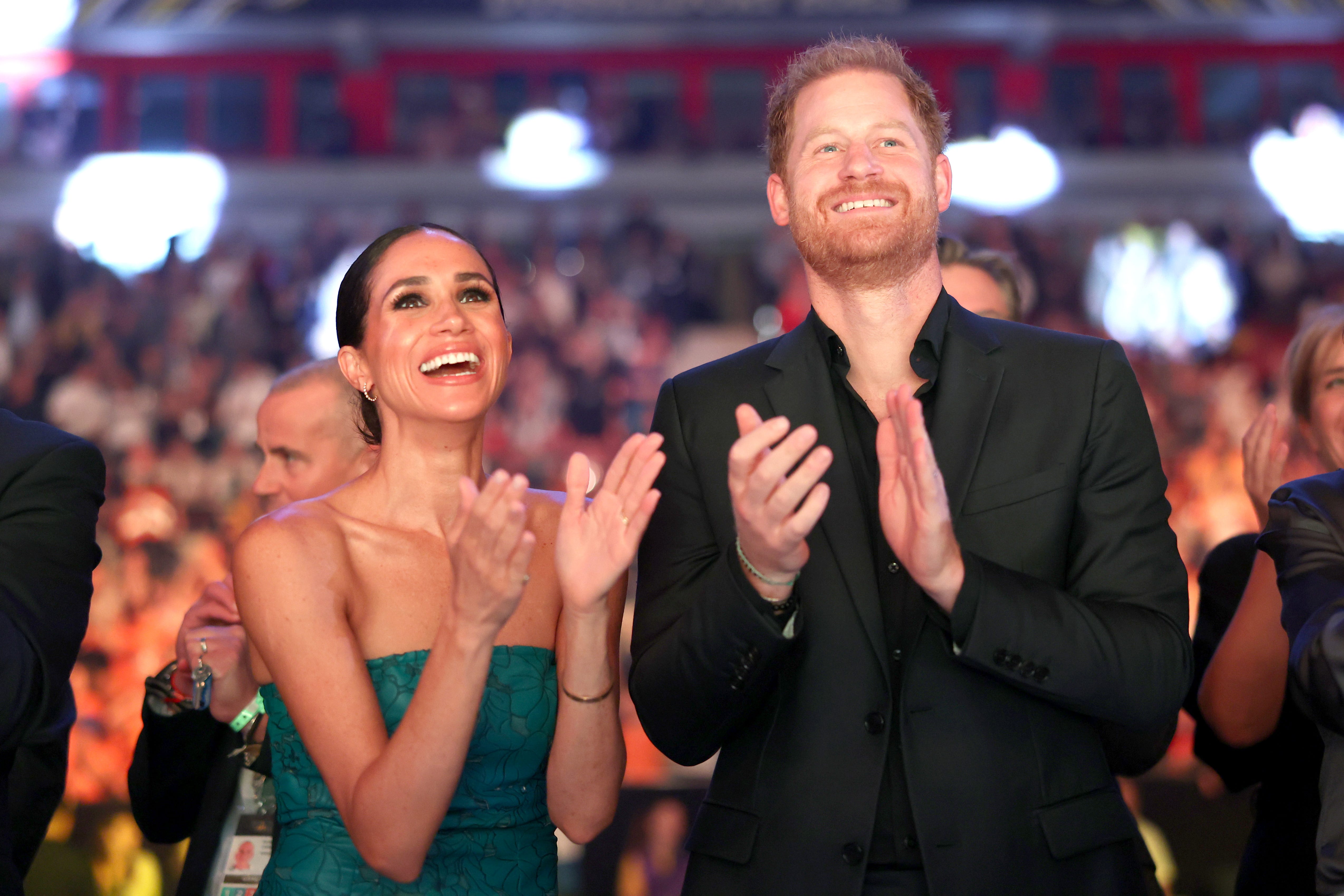 Duchess Meghan Is a Vision in a Strapless Turquoise Gown with Floral Lace Detailing