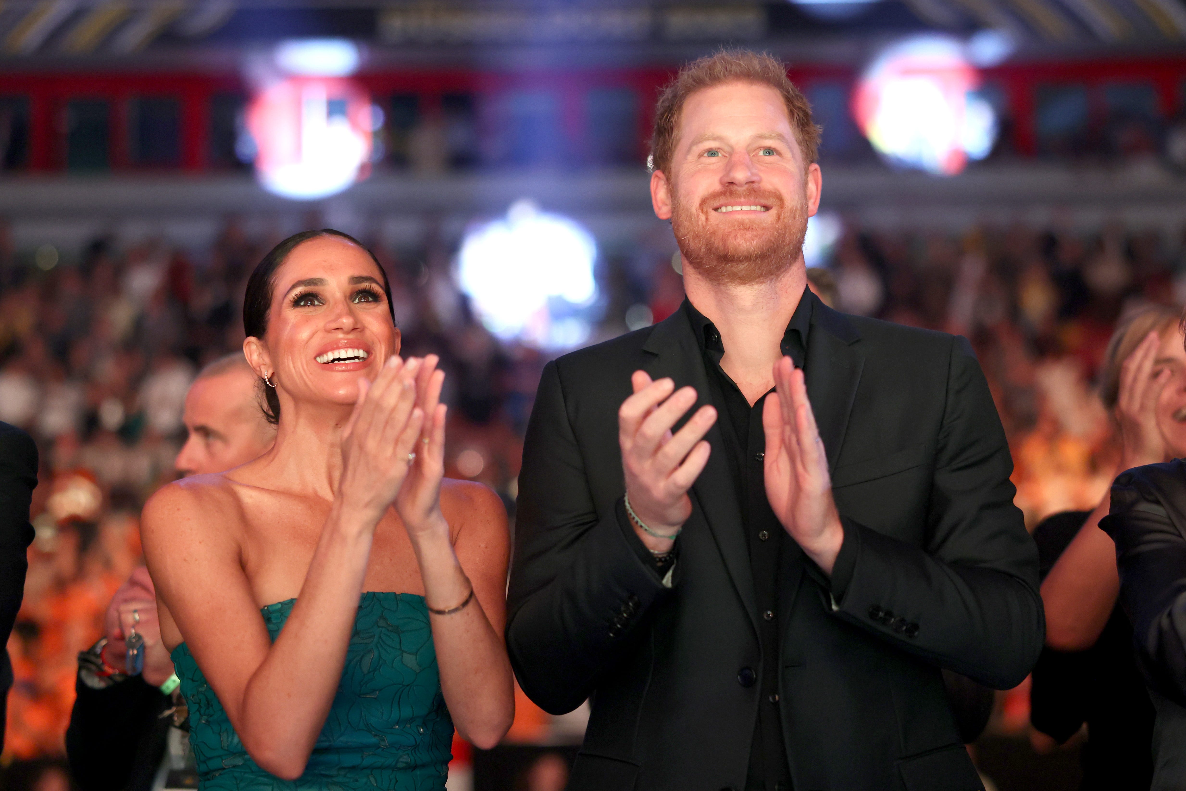 Duchess Meghan and Prince Harry Coordinate in Black for Katy Perry Concert