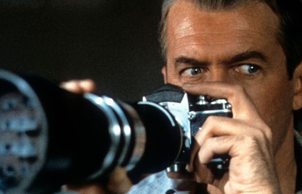 james stewart looks through his camera in a scene form the film rear window, 1954 photo by paramountgetty images