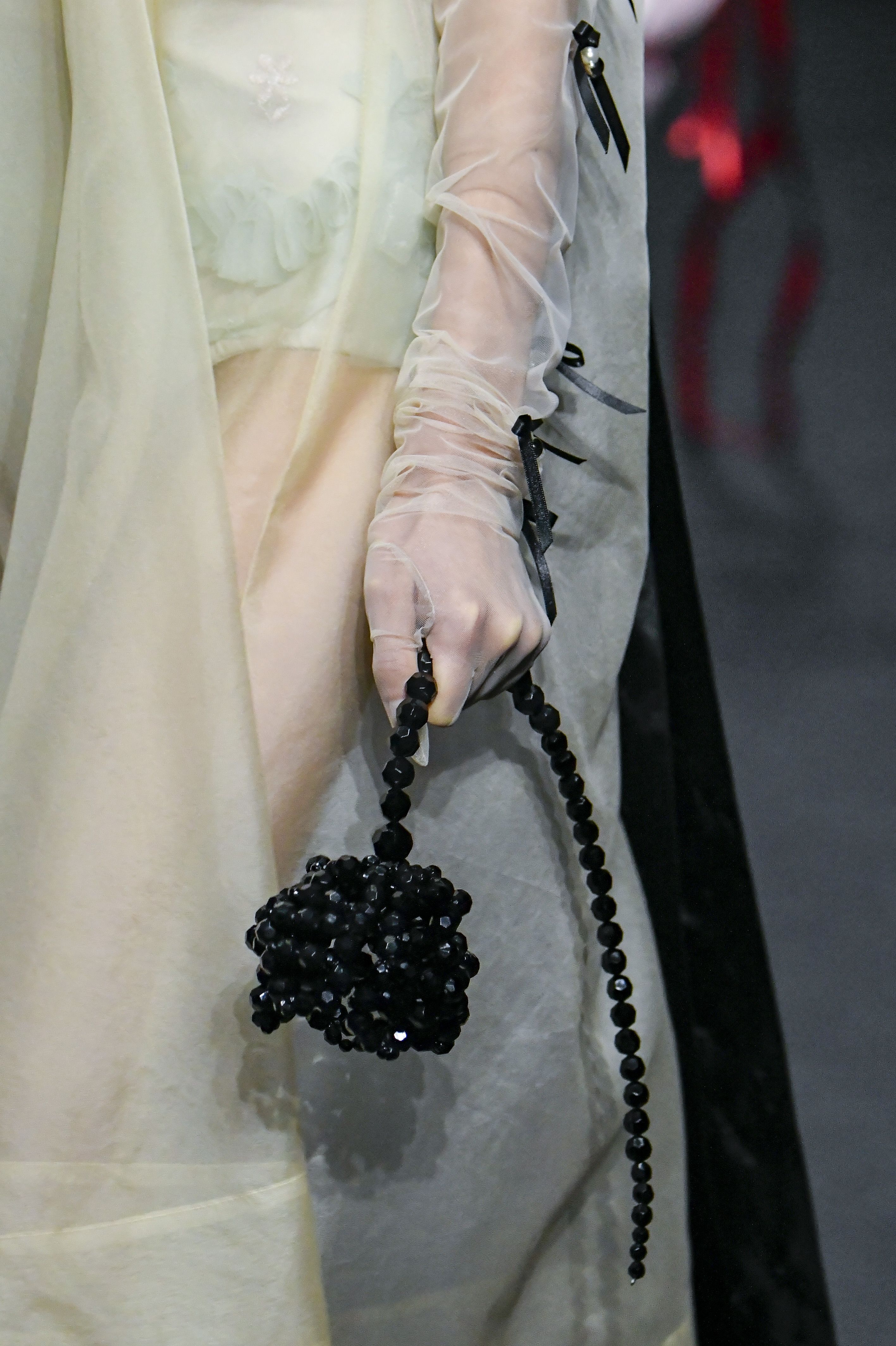 Simone Rocha Models Carried Beaded Flowers With Childlike Wonder