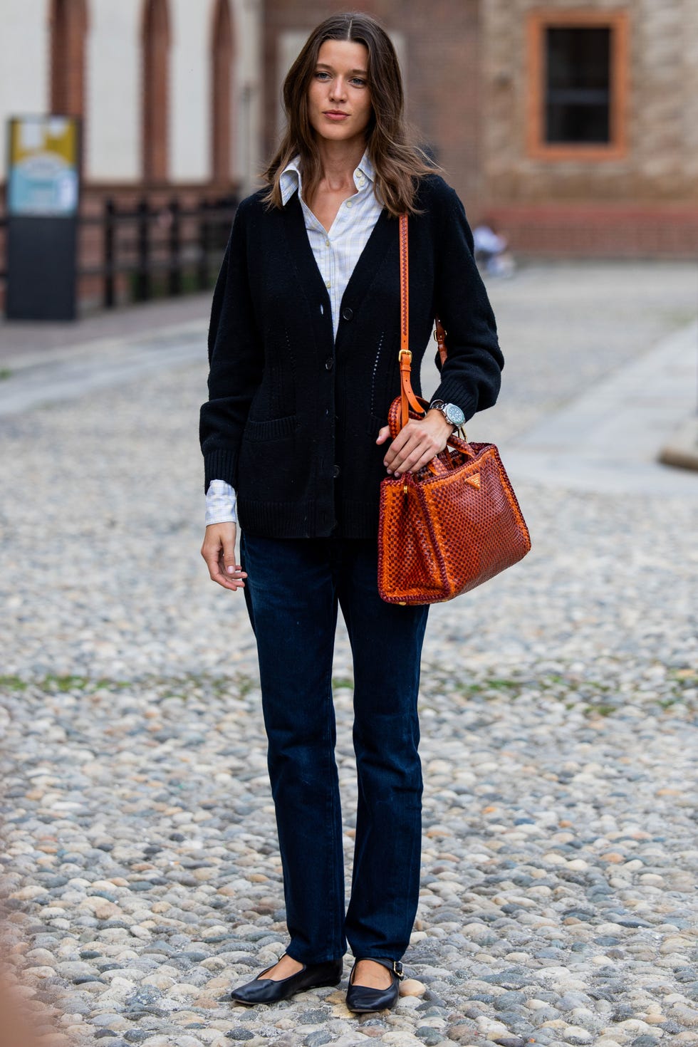 a woman holding a purse