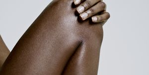 Close up of black females bent knee