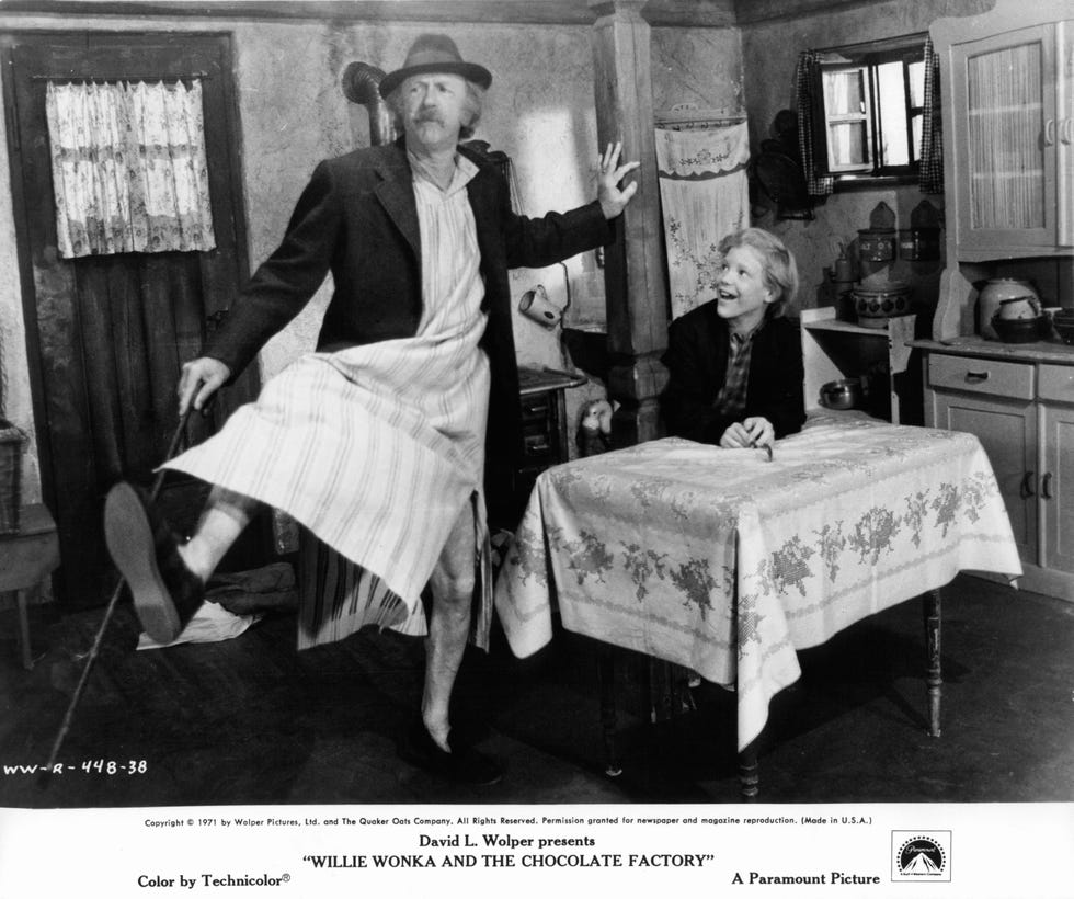 Jack Albertson dancing in front of Peter Ostrum in a scene from "Willy Wonka & the Chocolate Factory"