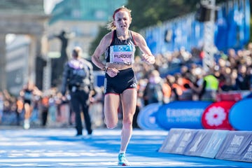 berlin, germany september 24 charlotte purdue from great britain crossing the finish line during the 2023 bmw berlin marathon on september 24, 2023 in berlin, germany photo by luciano limagetty images