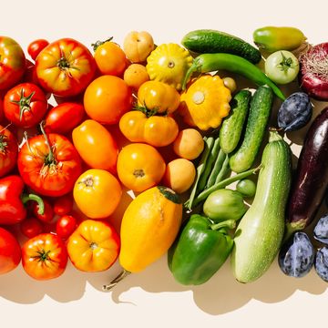 variety fresh of organic fruits and vegetables rainbow colors on beige background concept of food, vegetable, agriculture, harvest, food producer and healthy and vegetarian food flat lay, top view