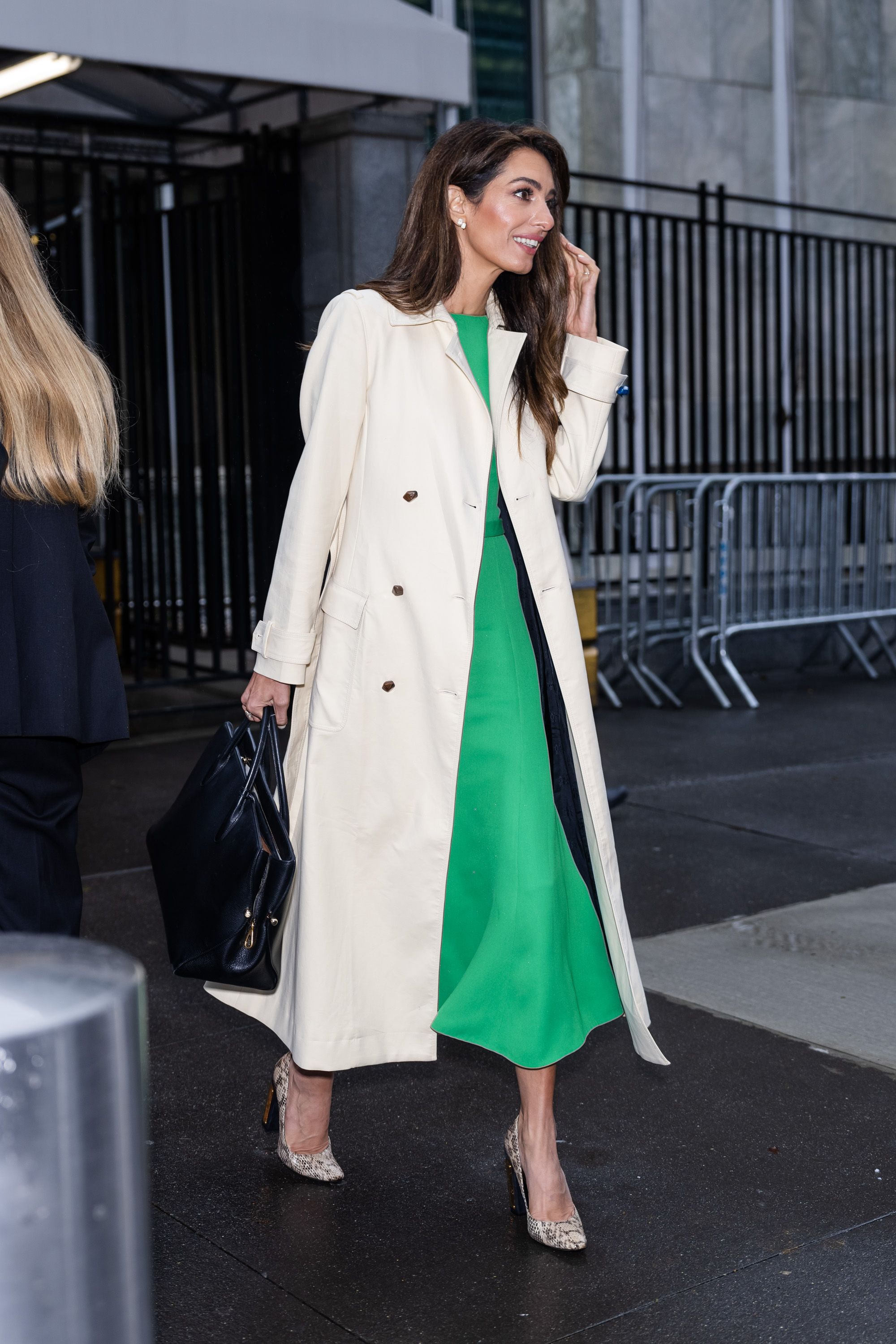 Amal Clooney Wore an Oversized Dior Bag With a Trench Coat