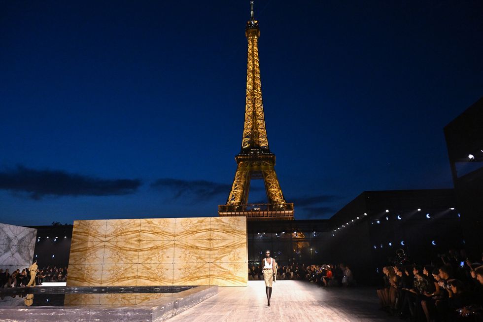 paris, france september 26 editorial use only for non editorial use please seek approval from fashion house a model walks the runway in front of the eiffal tower during the saint laurent womenswear springsummer 2024 show as part of paris fashion week on september 26, 2023 in paris, france photo by stephane cardinale corbiscorbis via getty images