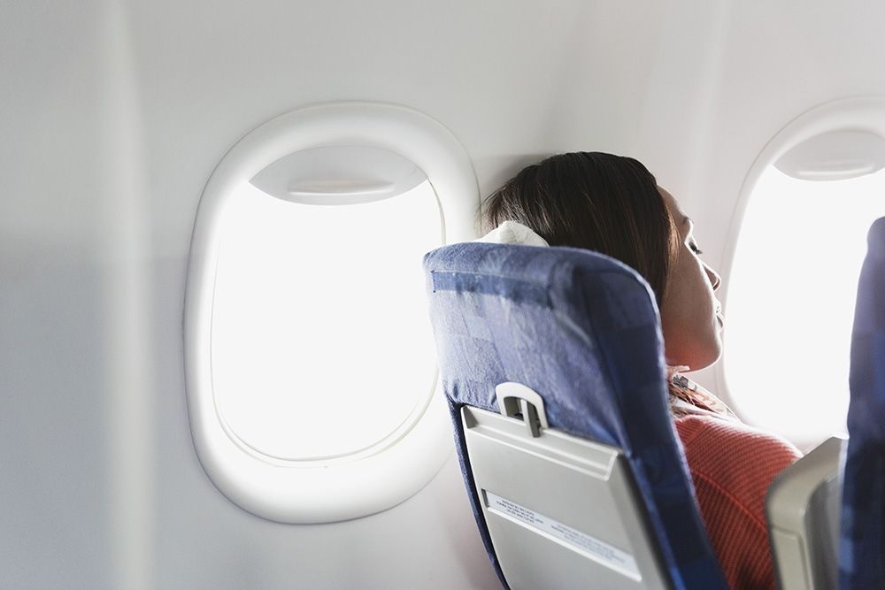 The unexpected thing cabin crew say will help you sleep on a plane