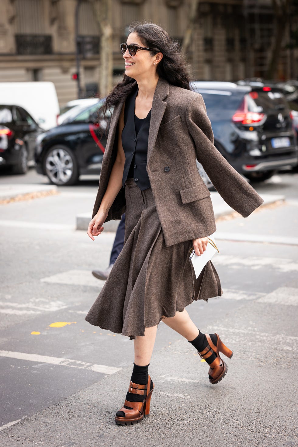 a woman walking on a street