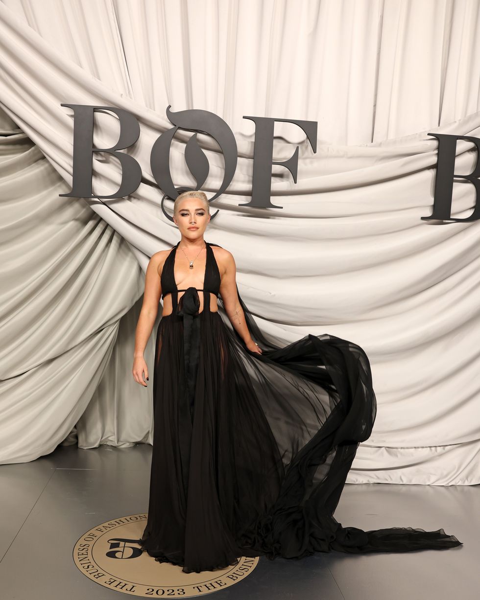 Florence Pugh Wears a Sheer Crop Top at Paris Fashion Week