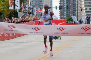 kenyas kelvin kiptum arrives at the finish line to win the 2023 bank of america chicago marathon in chicago, illinois, in a world record time of two hours and 35 seconds on october 8, 2023 photo by kamil krzaczynski afp photo by kamil krzaczynskiafp via getty images