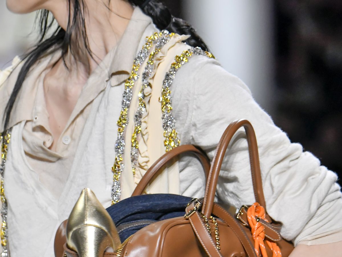 Miu Miu's Spring 2024 Models Carried Bags Stuffed With Stuff
