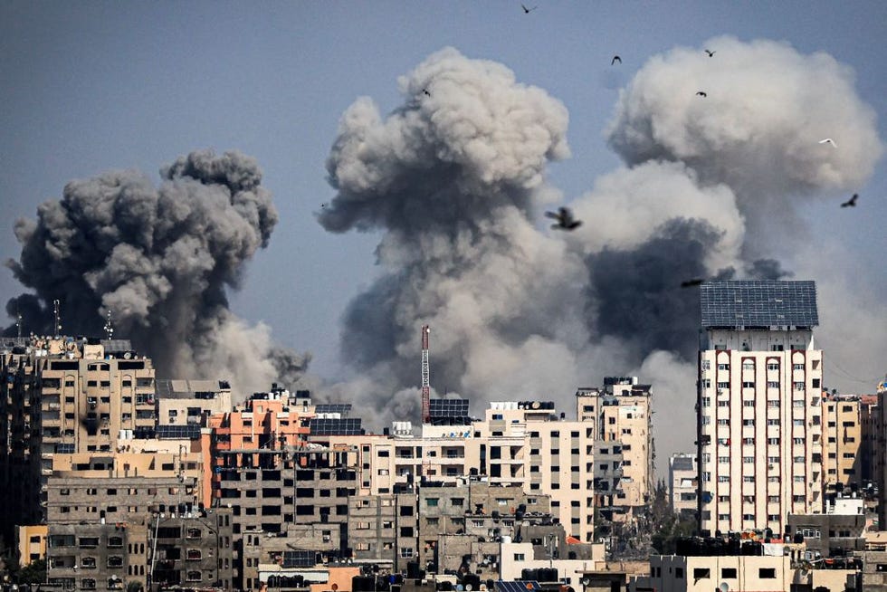 smoke plumes billow during israeli air strikes in gaza city on october 12, 2023 as raging battles between israel and the hamas movement continue for the sixth consecutive day thousands of people, both israeli and palestinians have died since october 7, 2023, after palestinian hamas militants based in the gaza strip, entered southern israel in a surprise attack leading israel to declare war on hamas in gaza on october 8 photo by mahmud hams afp photo by mahmud hamsafp via getty images