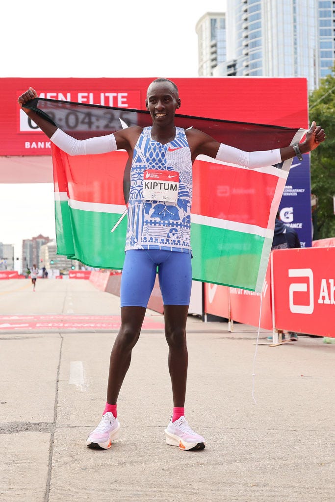 chicago, illinois october 08 kelvin kiptum of kenya celebrates after winning the 2023 chicago marathon professional mens division and setting a world record marathon time of 20035 at grant park on october 08, 2023 in chicago, illinois photo by michael reavesgetty images