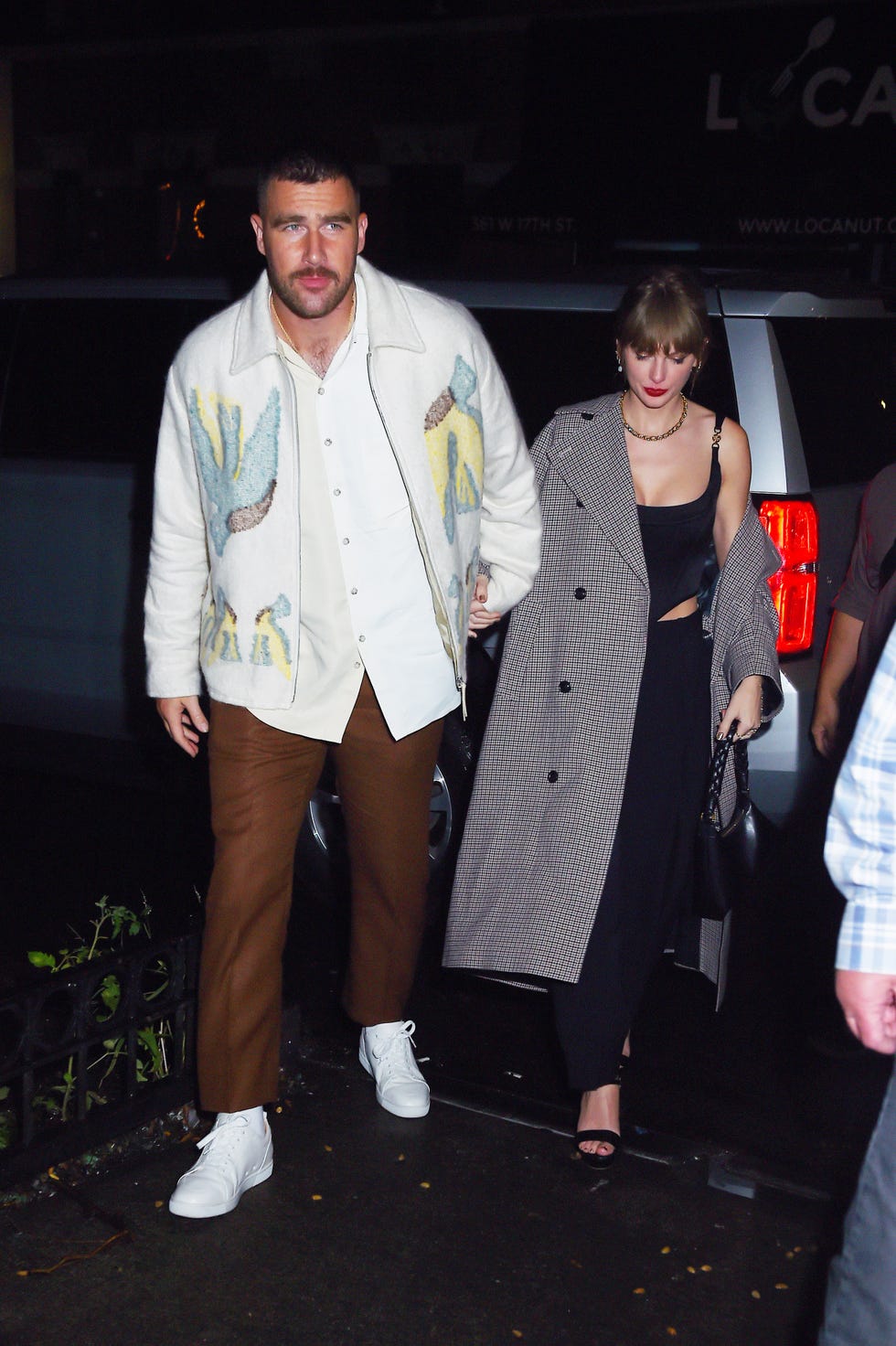 travis kelce and taylor swift leaving the snl after party in new york city on october 15, 2023