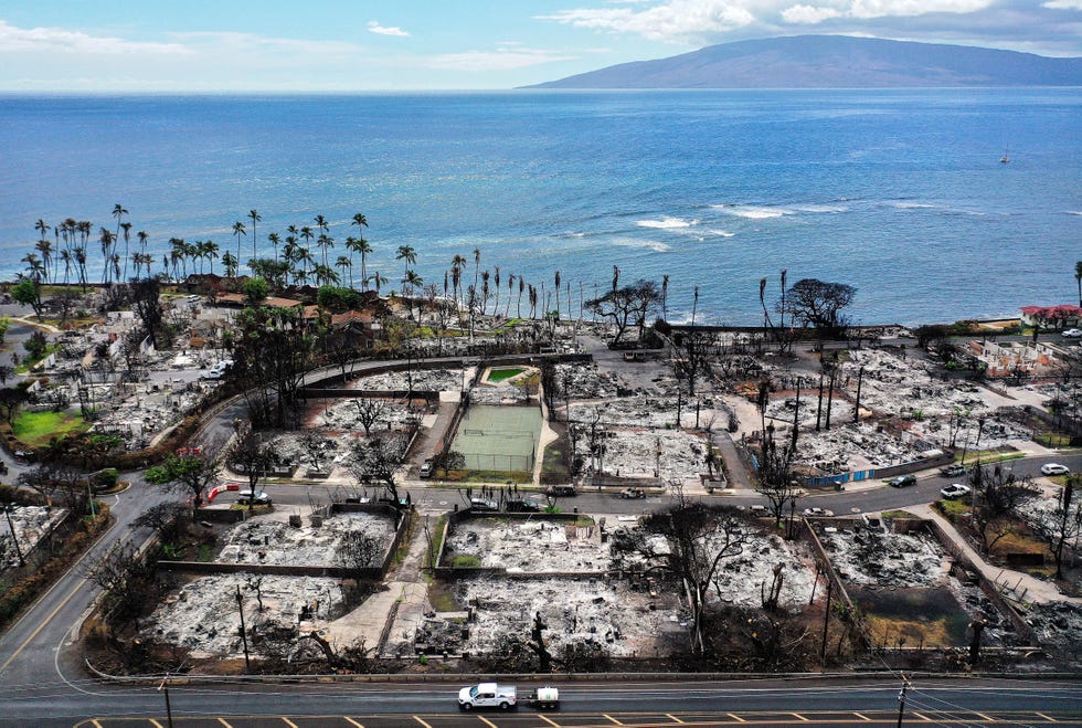 lahaina, hawaii october 09 in an aerial view, a recovery vehicle drives past burned structures and cars two months after a devastating wildfire on october 09, 2023 in lahaina, hawaii the wind whipped wildfire on august 8th killed at least 98 people while displacing thousands more and destroying over 2,000 buildings in the historic town, most of which were homes a phased reopening of tourist resort areas in west maui began october 8th on the two month anniversary of the deadliest wildfire in modern us history photo by mario tamagetty images