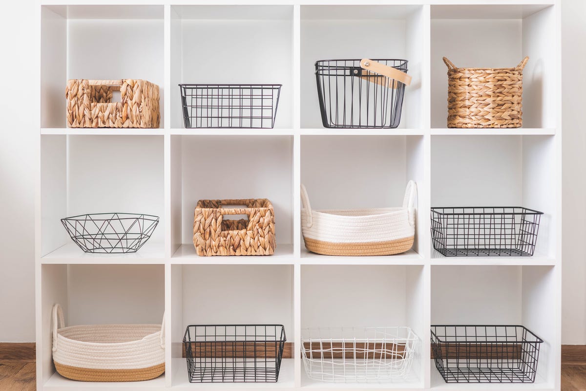 white stylish shelf in scandi style storage baskets japanese method organizer boxes set closet organizing concept