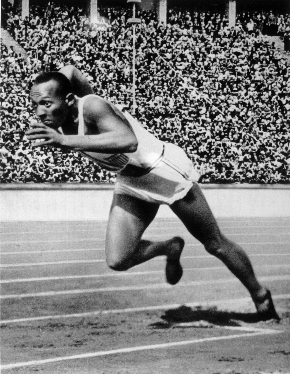 berlin 1936  jesse owens of the usa in action in the mens 200m at the 1936 summer olympic games held in berlin, germany owens won a total of four gold medals in the olympics, winning the mens 100m final, 200m final and the long jump competiton as well as being part of the victorious usa 4x100m relay team photo by getty imagesgetty images