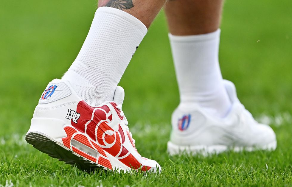 marseille, france october 15 a detailed view of the customised nike air max 90 trainers worn by joe marler of england obscured which are decorated with the branding of rugby world cup france 2023, the red rose emblem of england and inscribed with 1342, reflecting that he is the 1342nd player to play for england, prior to the rugby world cup france 2023 quarter final match between england and fiji at stade velodrome on october 15, 2023 in marseille, france photo by dan mullangetty images