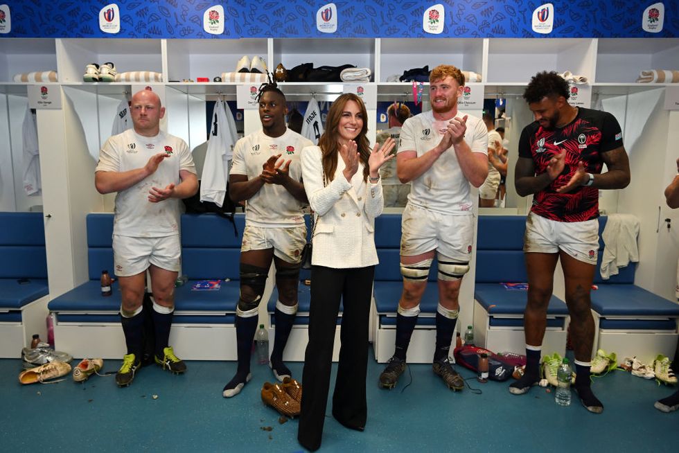 marseille, france october 15 catherine, princess of wales and patron of the rugby football union congratulates the england team on their victory in the changing room following the rugby world cup france 2023 quarter final match between england and fiji at stade velodrome on october 15, 2023 in marseille, france photo by dan mullangetty images