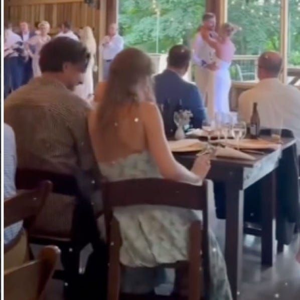Taylor Sneakily Attended a Wedding With Travis