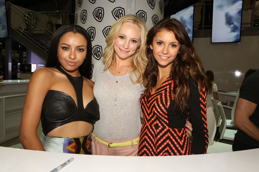 san diego, ca   july 20 in this handout photo provided by wbtv, "the vampire diaries" stars l r kat graham, candice accola and nina dobrev attend the warner bros booth during comic con 2013 on july 20, 2013 in san diego, california  photo by chris frawleywbtv via getty images