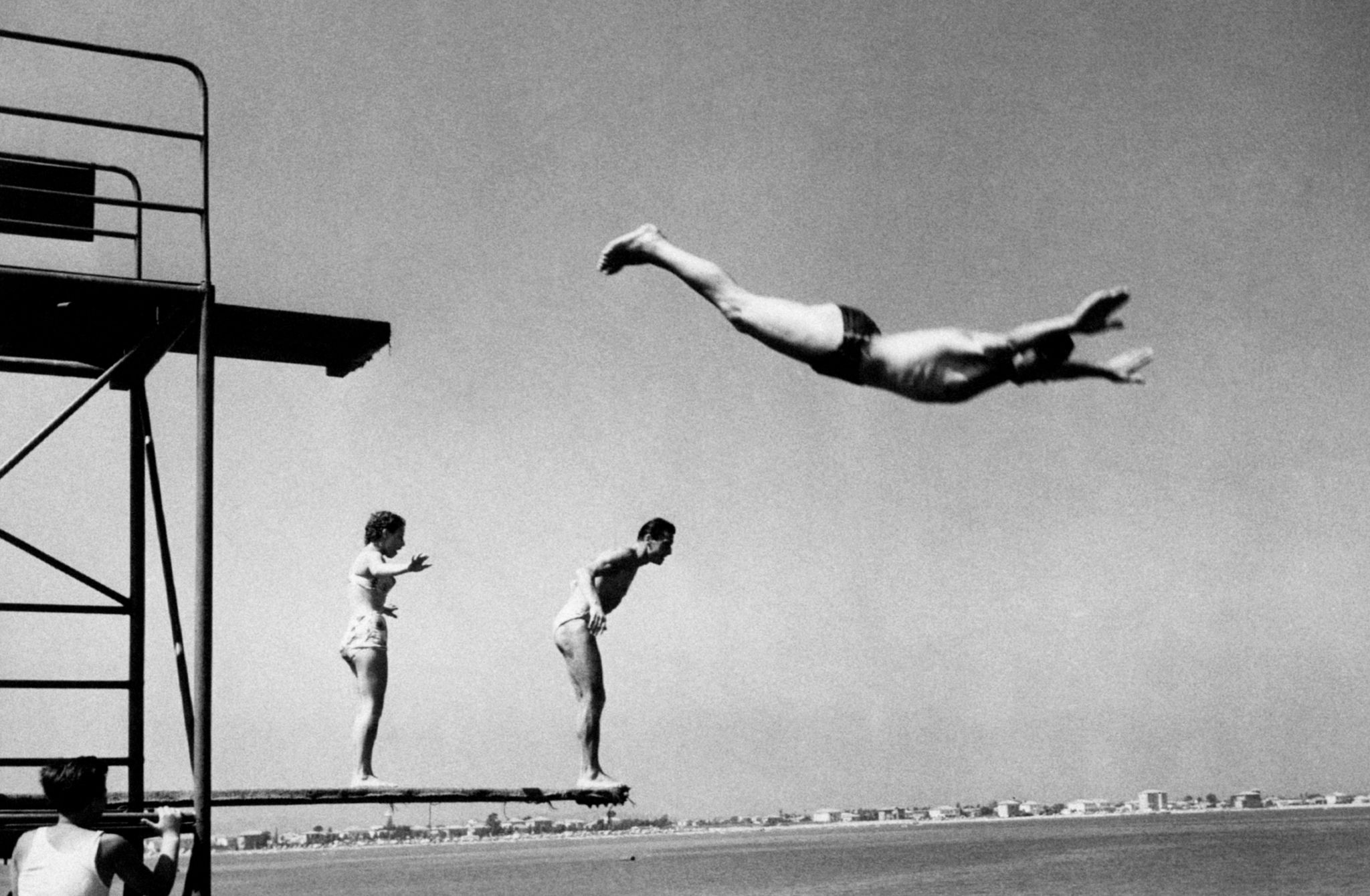 Some Bathers Dive Into The Water