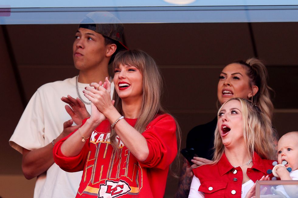 kansas city, missouri october 22 taylor swift and brittany mahomes react during a game between the los angeles chargers and kansas city chiefs at geha field at arrowhead stadium on october 22, 2023 in kansas city, missouri photo by jamie squiregetty images