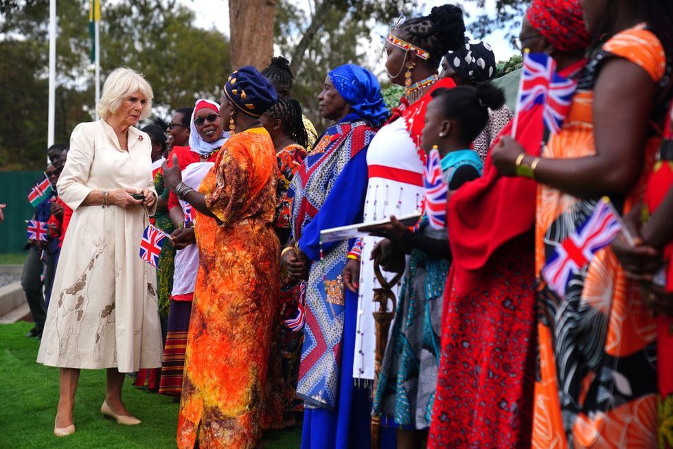 nairobi, kenya november 1 queen camilla iii meets members of the community during a visit to the commonwealth war graves commission cemetery in nairobi, joining british and kenyan military personnel in an act of remembrance, on day two of the state visit to kenya on november 1, 2023 in nairobi, kenya king charles iii and queen camilla are visiting kenya for four days at the invitation of kenyan president william ruto, to celebrate the relationship between the two countries the visit comes as kenya prepares to commemorate 60 years of independence photo by pool victoria jonesgetty images
